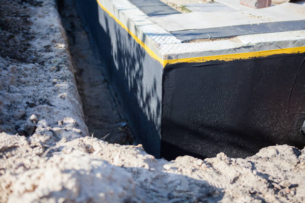 Professional Waterproofing technician working in Fair Oaks, GA